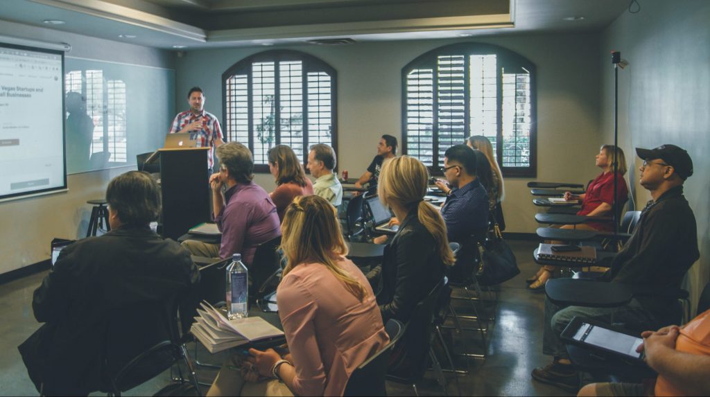 Delegates taking place in an in-person learning and development opportunities