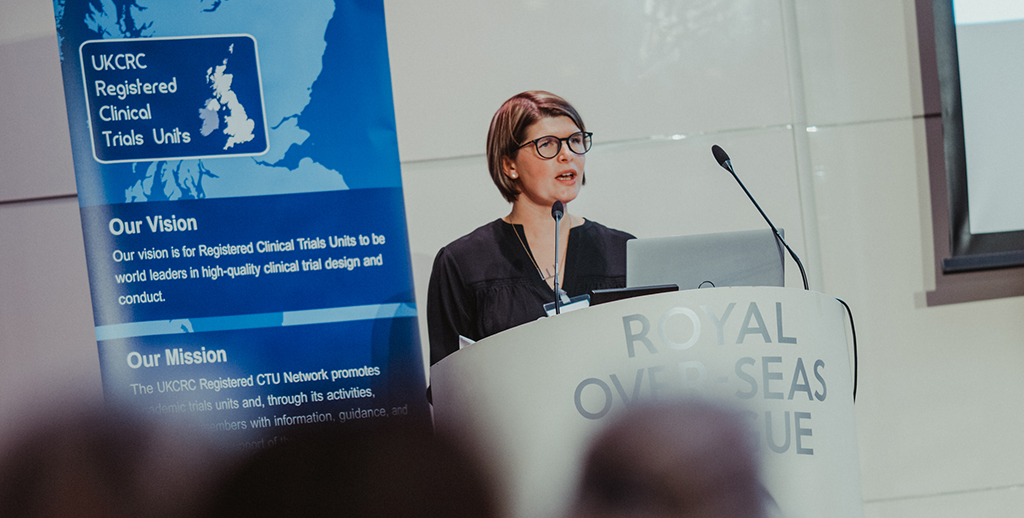 CTU Director presenting to an audience at a Registered Clinical Trials Unit (CTU) Network event.